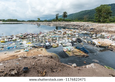 Plastic waste in the water,Garbage pile in landfill. Stock photo © 