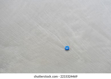 Plastic Water Bottle Cap On Pattaya Beach