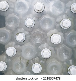 Plastic Water Bottle Wall. Recycled Building Wall.