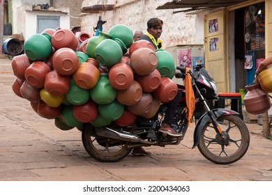 Plastic Water Storage Container Or Ghada Seller On Motorcycle. Shot At Badami On 24 July 2022