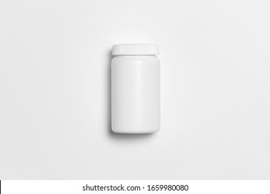 Plastic White Pill Or Vitamin Dietary Supplement Bottle, Medical Drug Plastic Bottle Isolated On White Background With Clipping Path.High Resolution Photo.Top View