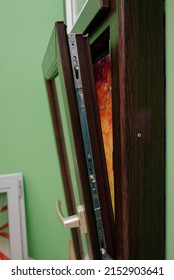 Plastic window handle close up.Opened plastic window close up