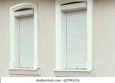 Plastic windows with roller shutters
