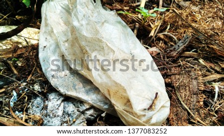 plastic wrap pollution on the ground 