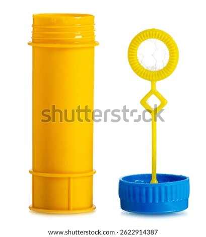 Plastic yellow bottle of soap bubbles isolated on white background