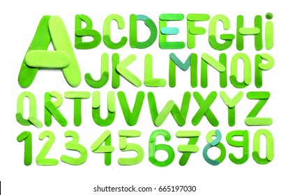 Plasticine letter. Green plasticine alphabet, isolated.
