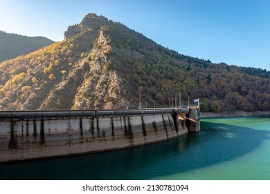 The Plastiras Dam, a concrete arch dam in Karditsa regional unit, Greece that impounds the Tavropos River, creating the artificial lake Plastiras. 