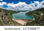 Plastiras Lake dam, Greece. Concrete infrastructure construction for the artificial lake in Karditsa, Thessaly. Aerial drone view