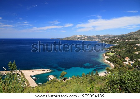 Plat town coast in Dalmatia, Croatia. Landscape with Adriatic Sea and mountains.
