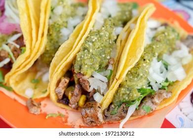 A Plate Of Authentic Mexican Tacos At A Taco Stand.