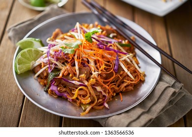 Plate Of Beef Pad Thai And Chopsticks