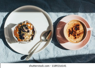 Plate Of Blueberry Muffin And Cup Of Coffee