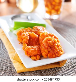 Plate Of Boneless Buffalo Flavored Chicken Wings