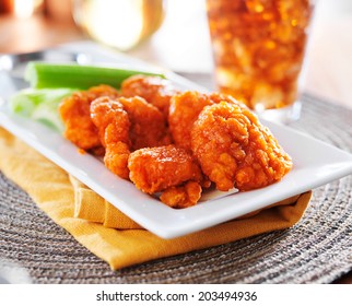 Plate Of Boneless Buffalo Flavored Chicken Wings