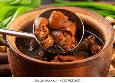 A plate of braised pork feet - Powered by Shutterstock