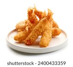 plate of breaded Torpedo shrimps isolated on white background