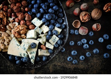 A Plate With Cheese, Nuts And Blueberries. Healthy Snack. Cheese Plate. Keto Snack. Keto Dessert.