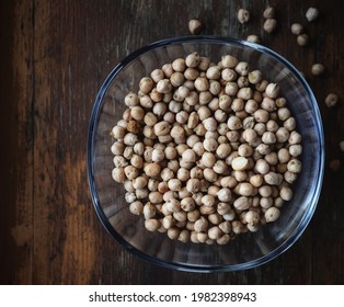 Plate With Chick Peas On Wooden Background - View From Above