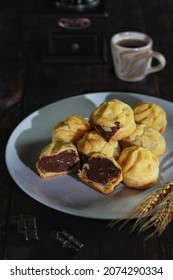 A Plate Of Chocolate Creampuff