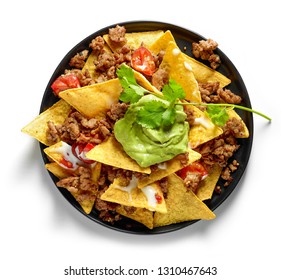 plate of corn chips nachos with fried minced meat and guacamole isolated on white background, top view - Powered by Shutterstock