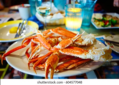 Plate With Crab Legs In A Restaurant In Key West Or New Orleans. Tasty Delicious Seafood.