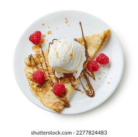 plate of crepe with ice cream and raspberries isolated on white background, top view - Powered by Shutterstock