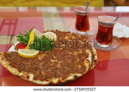 Plate of Delectable Lahmacun, a Thin and Crispy Turkish Pizza Topped with Spiced Minced Meat