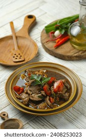 A plate of delicious blackpepper beef on rustic plate. Sapi lada hitam