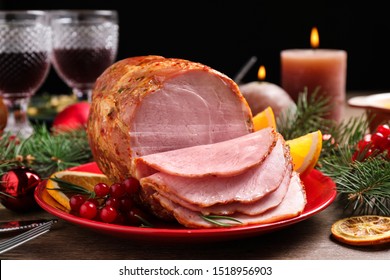 Plate With Delicious Ham Served On Wooden Table. Christmas Dinner