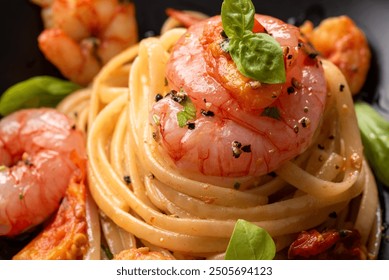 Plate of delicious linguine with shrimp and tomato sauce, italian pasta, mediterranean cuisine  - Powered by Shutterstock