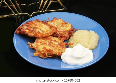 A Plate Of Delicious Potato Pancakes, Or 