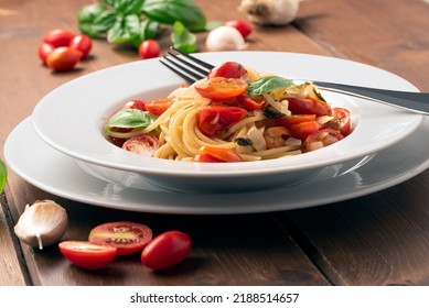 Plate of delicious spaghetti with pachino tomatoes, Italian pasta