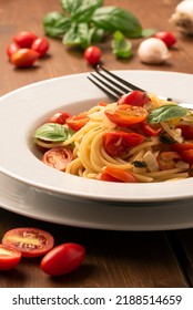 Plate of delicious spaghetti with pachino tomatoes, Italian pasta