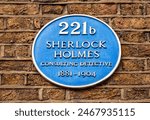 Plate with detective Sherlock Holmes name on Baker street 221b, London, UK
