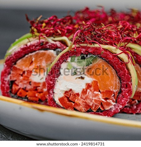 A plate filled with an assortment of sushi rolls adorned with various toppings, showcased in a visually appealing arrangement.