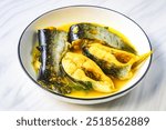 a plate of fish soup