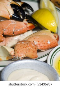 plate of florida stone crab claws with lemon butter and mustard as photographed in south beach miami florida