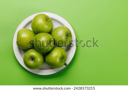 Similar – Image, Stock Photo Apple on green plate Fruit