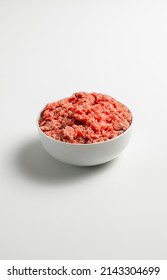 Plate With Fresh Ground Beef On A White Background, Space For Text, Stock Photo