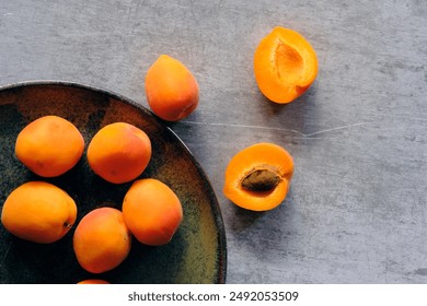 a plate of fresh ripe apricots - Powered by Shutterstock