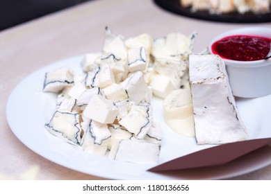 Plate Of Fresh Sliced Goat Cheese Ready For Degustation