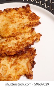 Plate with freshly fried latkes, traditional jewish food