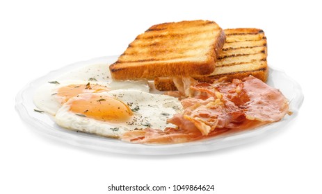 Plate with fried eggs, bacon and toasts on white background