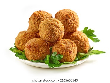plate of fried falafel balls and parsley leaves isolated on white background - Shutterstock ID 2165658543