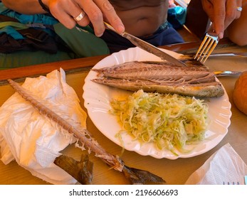 Plate With A Fried Fish And Coleslaw