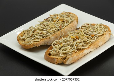 Plate Of Fried Glass Eel Toast In Olive Oil