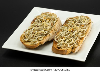 Plate Of Fried Glass Eel Toast In Olive Oil