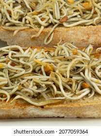 Plate Of Fried Glass Eel Toast In Olive Oil