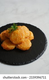 A Plate Of Fried Potato Cake Or Perkedel Kentang Against White Background