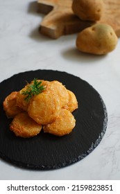 A Plate Of Fried Potato Cake Or Perkedel Kentang Against White Background